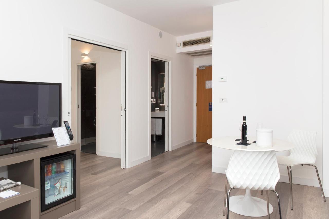 City Hotel & Suites Фолиньо Екстериор снимка